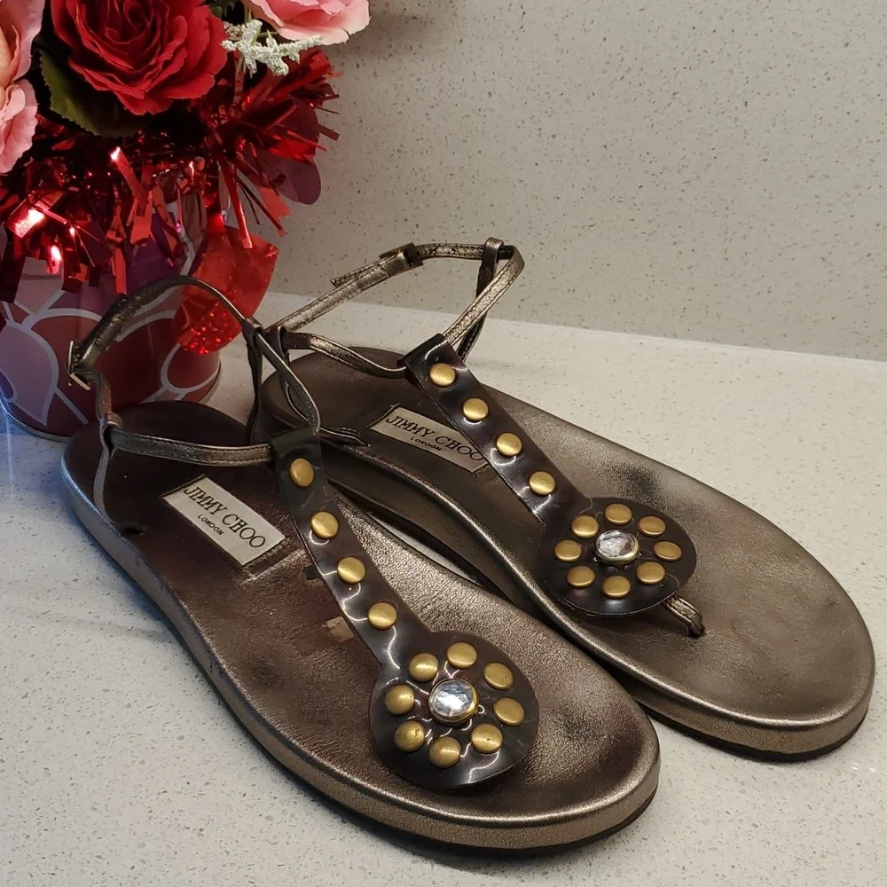 Jimmy Choo Metallic Bronze T-Strap Flat Sandals with Studs and Crystal